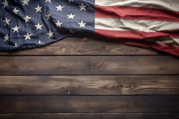 National flag draped across dark wooden boards