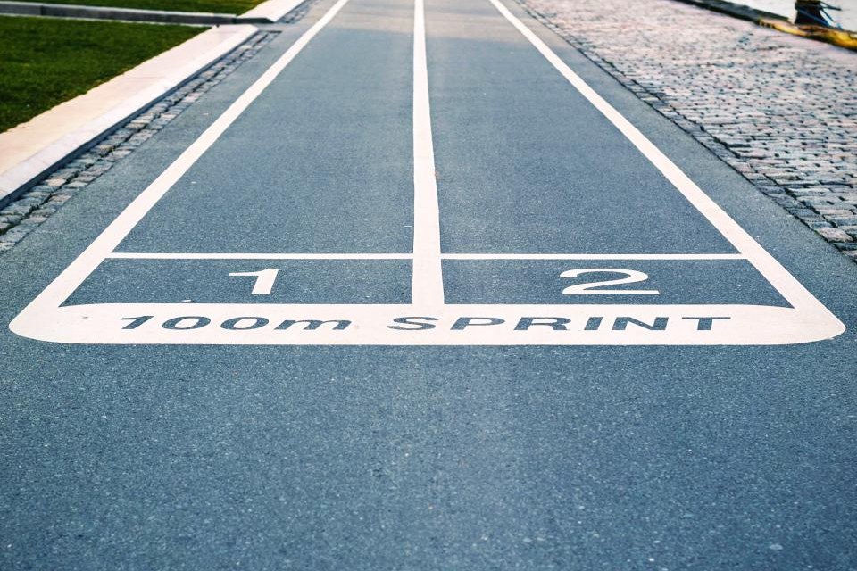 Running track lanes marked 100m sprint