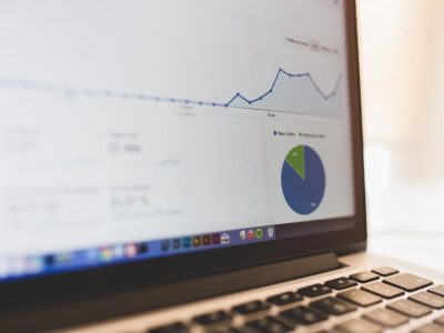 Laptop screen showing a website analytics dashboard