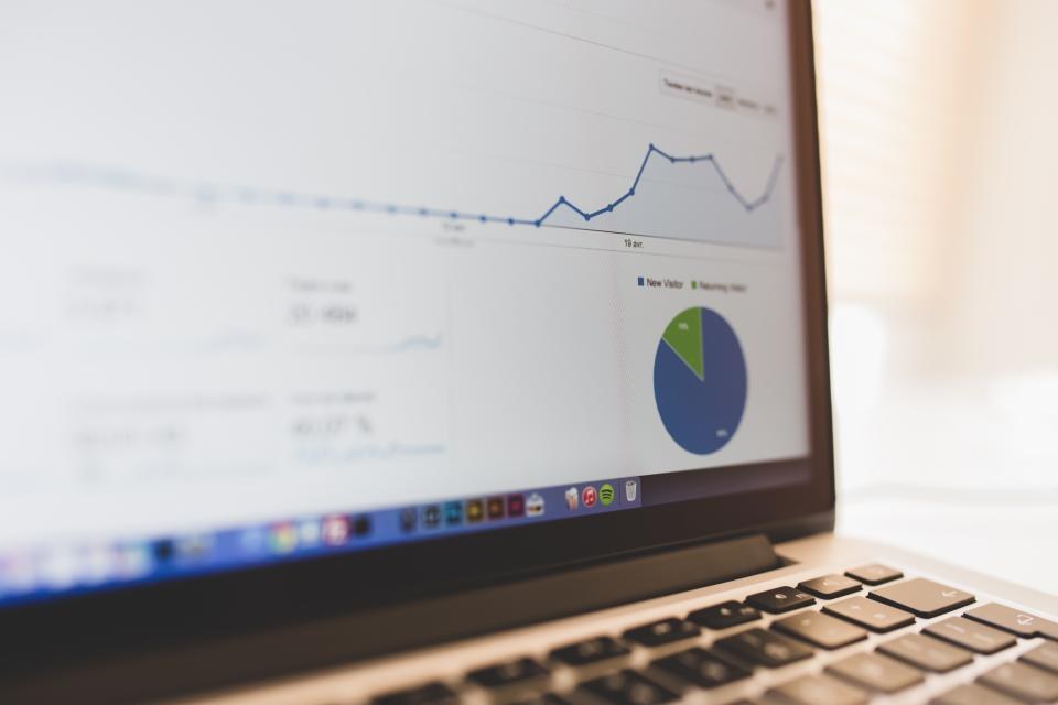 Laptop screen showing a website analytics dashboard